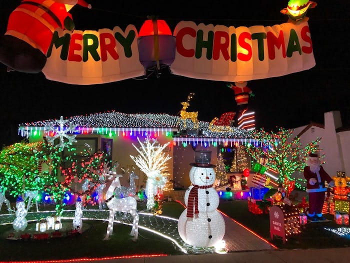 People in self-isolation are trying to spread cheer with Christmas lights.