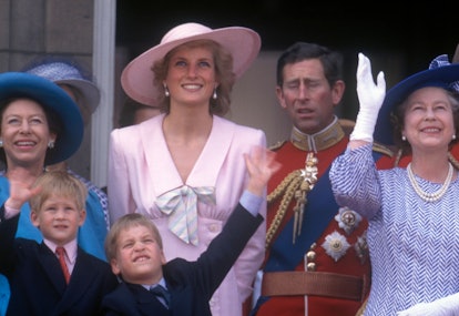 Princess Diana smiles while surrounded by family