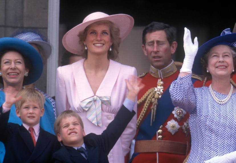 Princess Diana smiles while surrounded by family