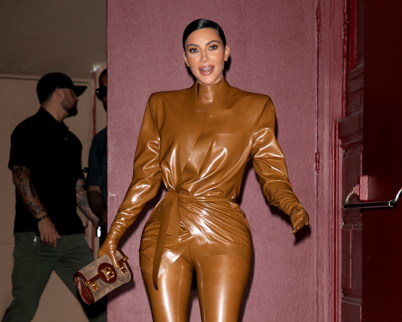 Watch Kim Kardashian squeeze into her latex suit during Paris