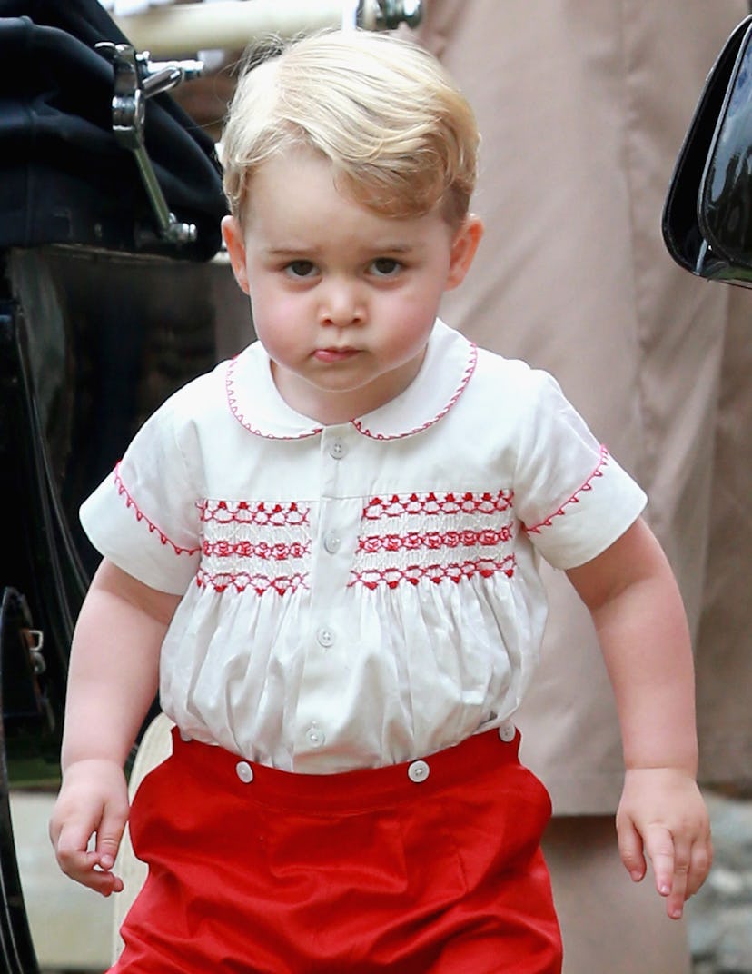 Prince George at Princess Charlotte's christening.