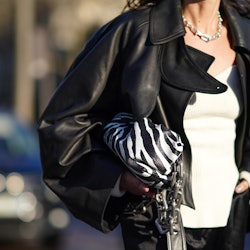 A model walking in a Bottega Veneta outfit