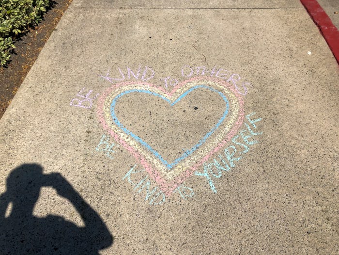 People are writing on their sidewalks in an effort to communicate messages of hope.