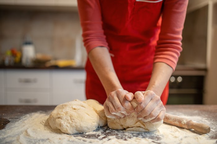 Experts say the urge to bake bread and make things during a crisis is evolutionary.