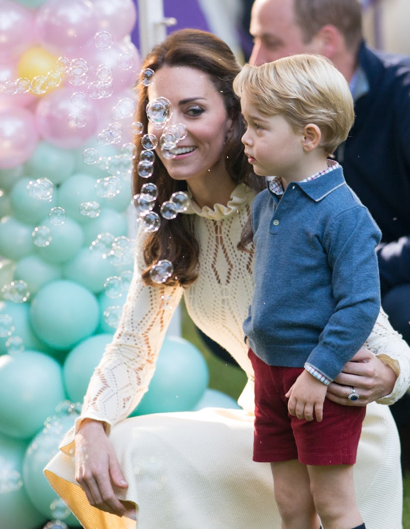 Kate Middleton and Prince George loving the bubbles.