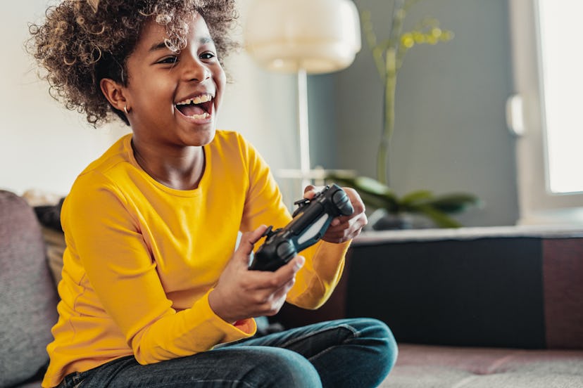 boy playing video games to relieve stress based on zodiac sign