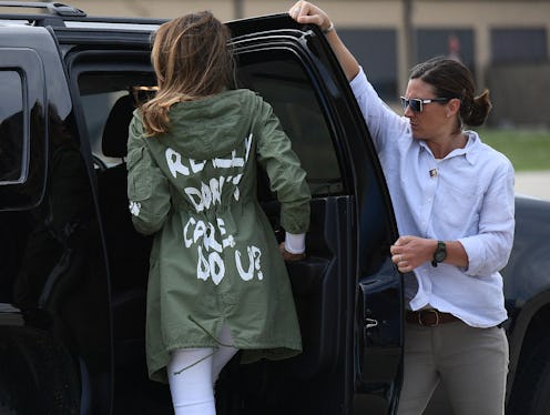  Melania Trump entering a car while wearing her 'I really don't care' jacket.'