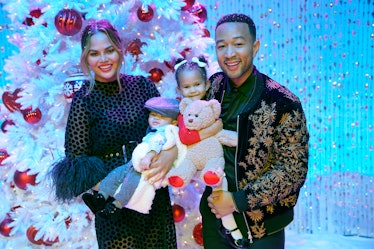 Chrissy Teigen and John Legend pose with their two kids, Luna and Miles.