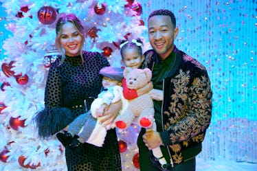 Chrissy Teigen and John Legend pose with their two kids, Luna and Miles.