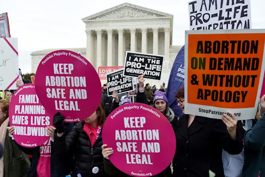 The Supreme Court is set to hear arguments in the first major abortion access case it will tackle un...