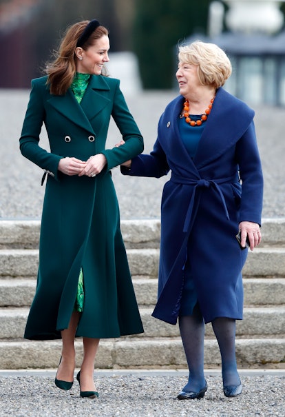 Kate Middleton met the President of Ireland wearing a Catherine Walker coat and Alessandra Rich dres...