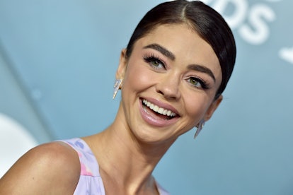 Sarah Hyland from Modern Family smiling for a photo