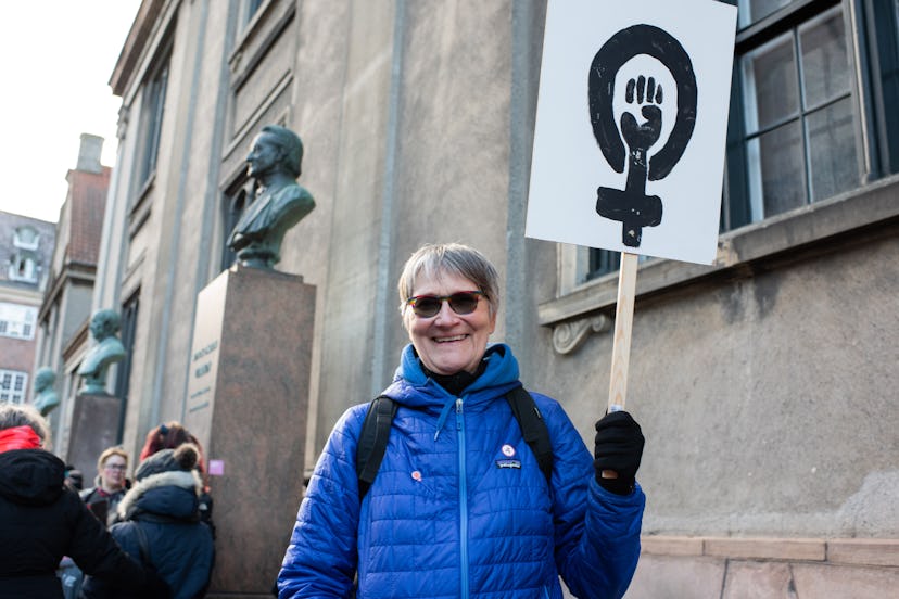 woman with feminist sign