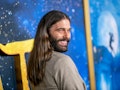 Jonathan Van Ness smiling and looking over the shoulder