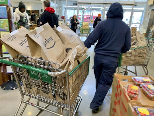 Amazon announced Sunday that, in an effort to meet increased demand for grocery delivery during the ...