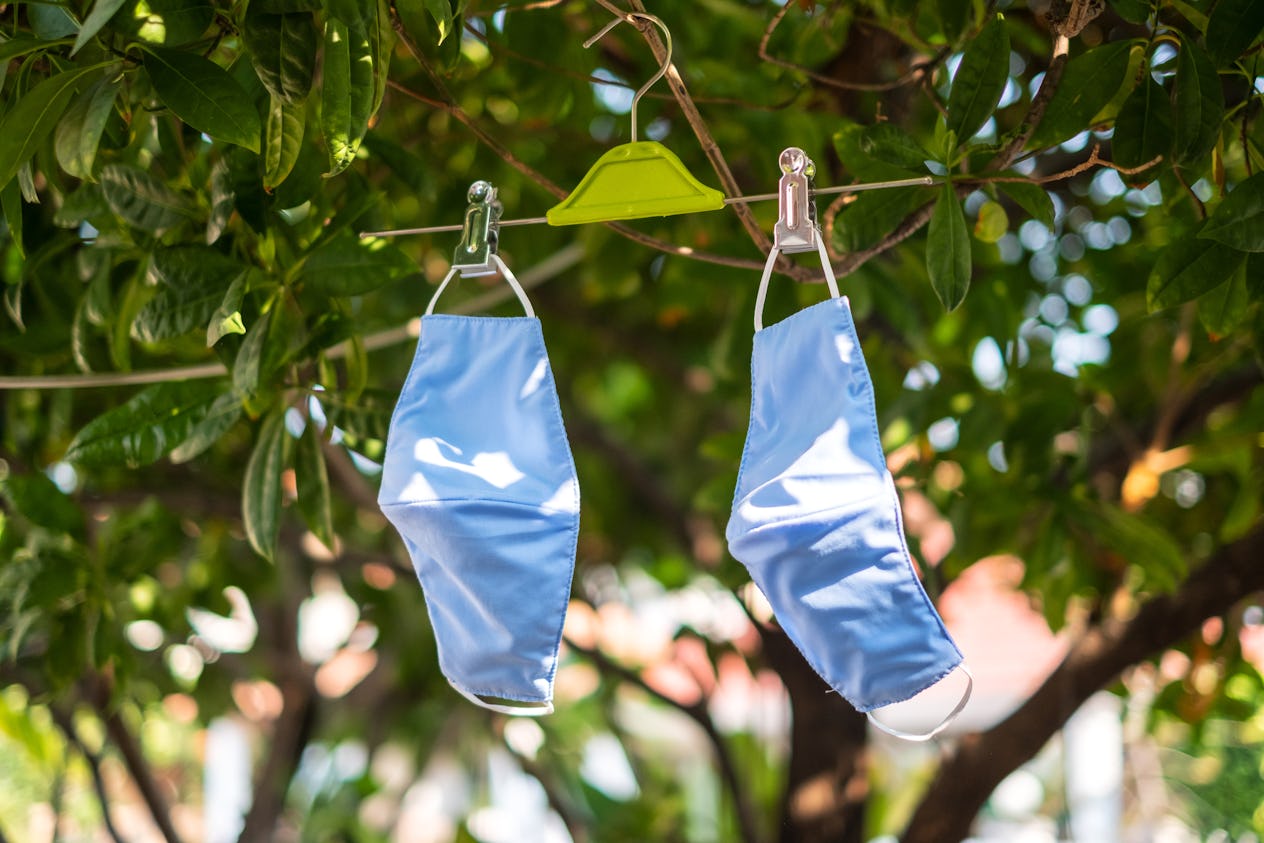 Can You Wash A Face Mask After Using It? Here's How To Do It Right