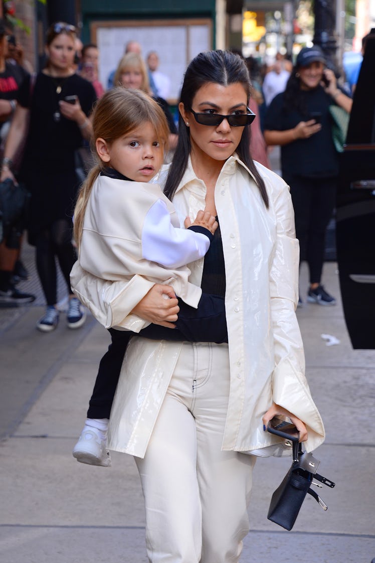 Kourtney Kardashian steps out with son Reign.