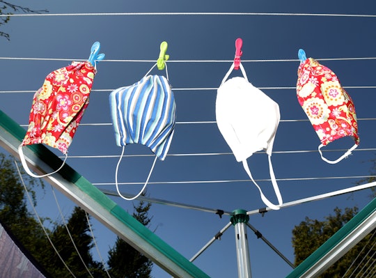 face masks on a laundry line