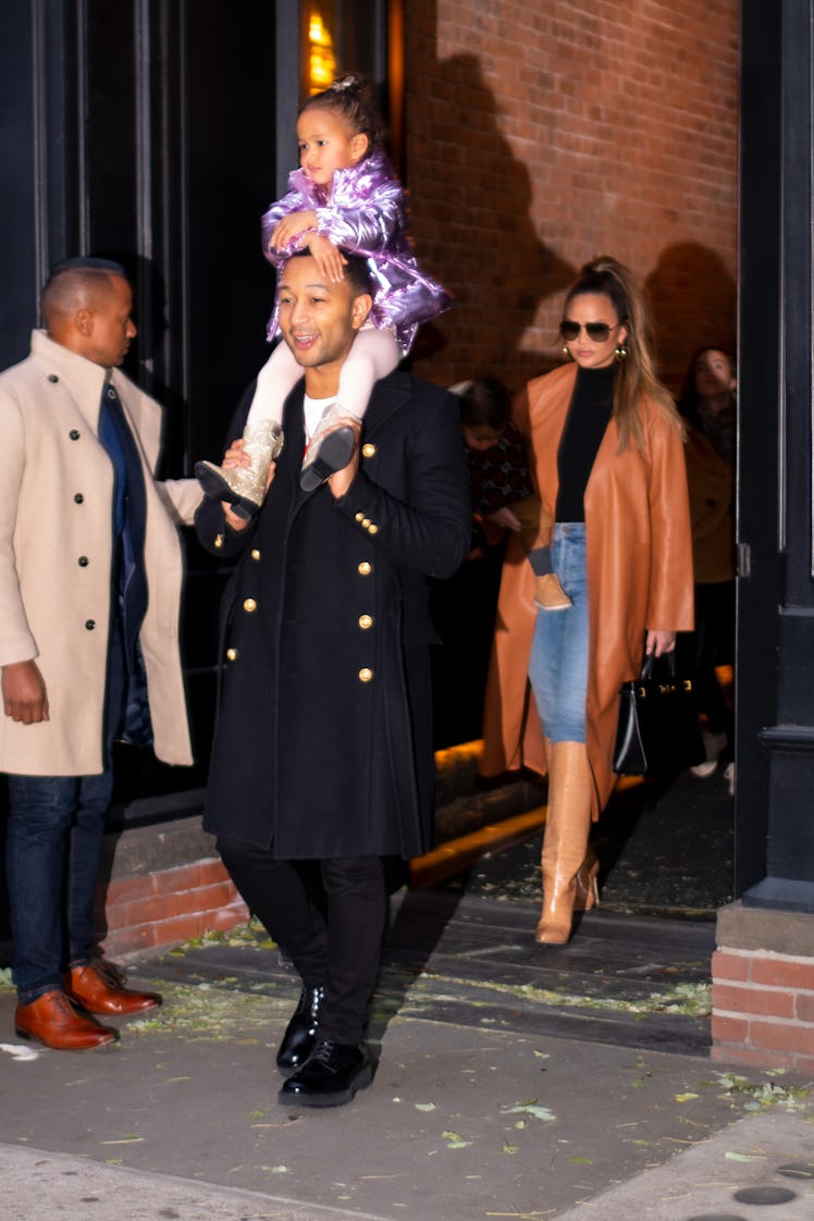 Chrissy Teigen and John Legend step out with their daughter, Luna.