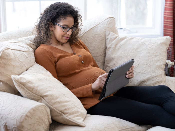 pregnant woman taking online lamaze class