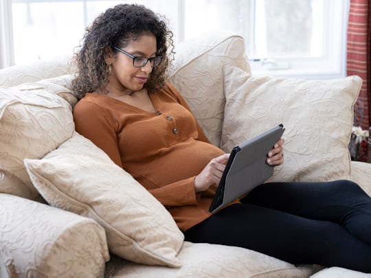 pregnant woman taking online lamaze class