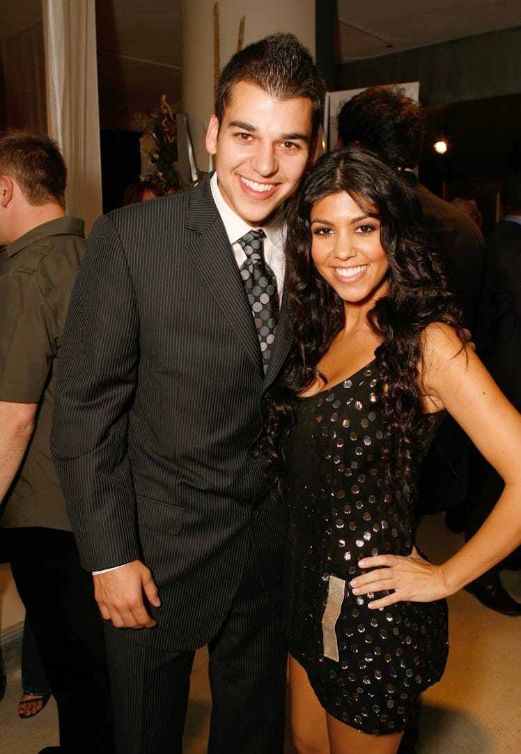 Rob Kardashian and Kourtney Kardashian pose for a photo.