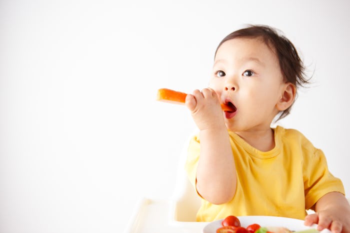 toddler girl eating