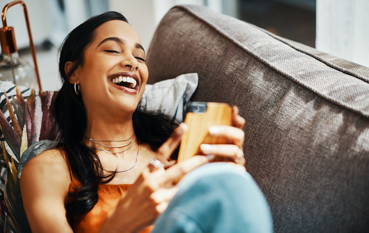 A woman texting her partner dirty jokes.