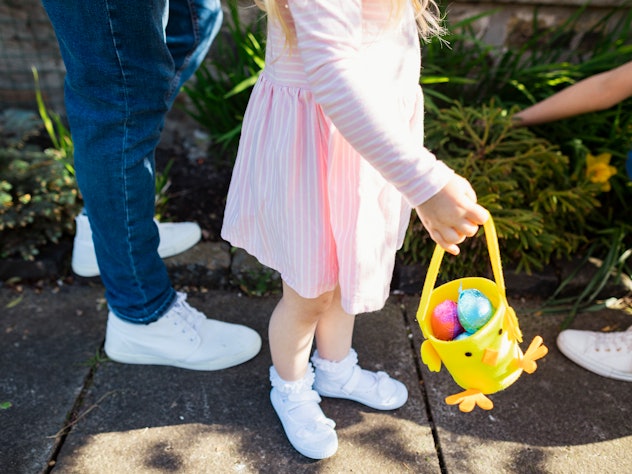 little girl with easter egg basket