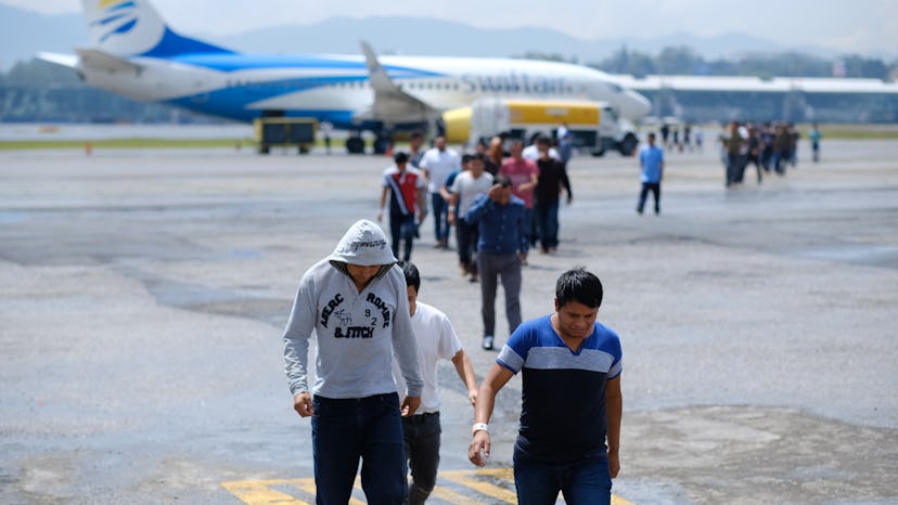 Guatemalans who were deported from the United States arriving at La Aurora International airport in ...