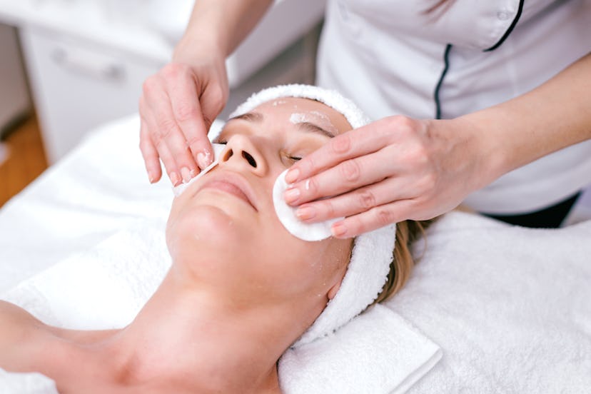 A woman having a facial treatment