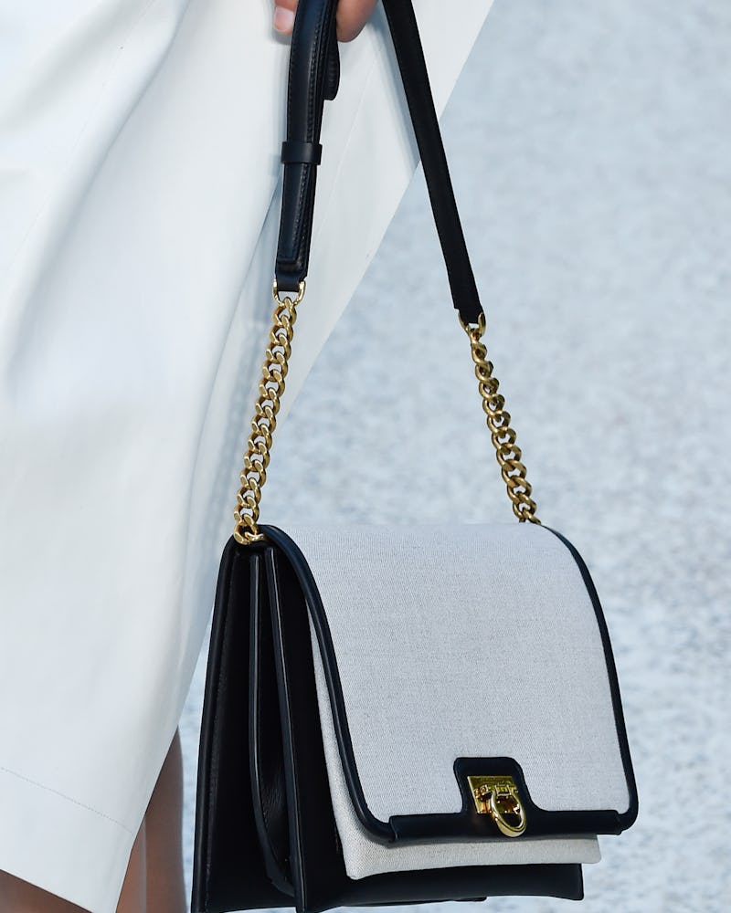 A model with a Salvatore Ferragamo SS20 bag, as one of the 4 Summer 2020 handbag trends you can inve...