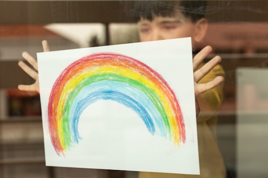 People are hanging rainbows in their windows as a way to stay connected.