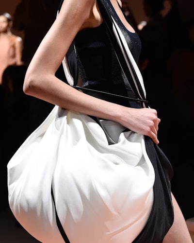 A model with a Hermes SS20 bag, as one of the 4 Summer 2020 handbag trends you can invest in now and...