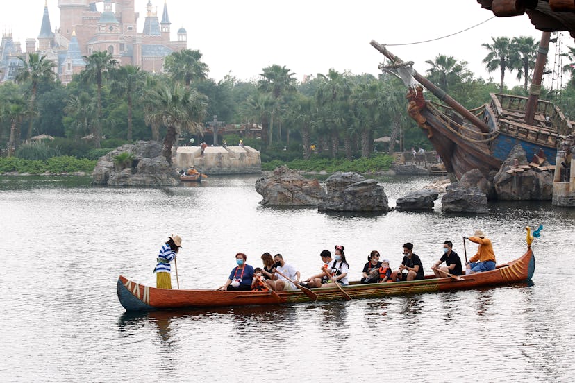 Guests enjoy a gondola ride through the park's waters