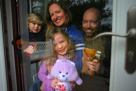 a family having a teddy bear scavenger hunt during quarantine