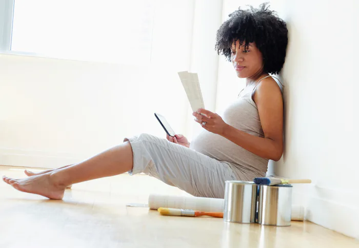 pregnant woman painting