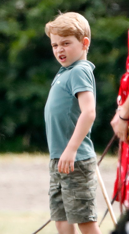 Prince George in shorts and a t-shirt.