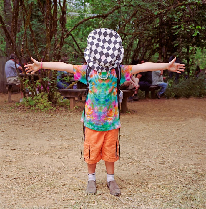 kid weaering tie dye shirt