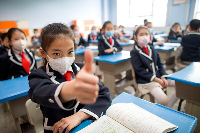 Photos from countries that have begun welcoming students back into classrooms provide a peek at what...