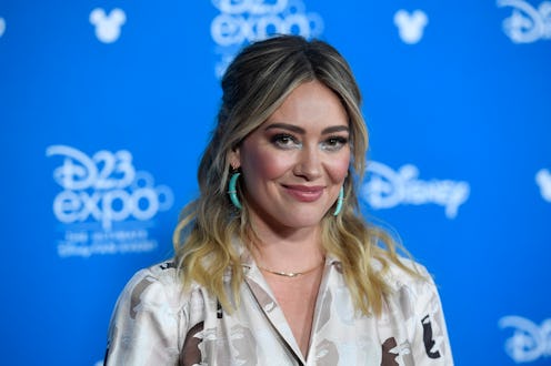 Hilary Duff's latest makeup tutorial features face crystals and an electric-blue cat-eye