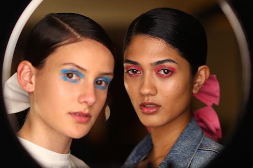 The monochromatic eyeshadow trend on two models backstage.