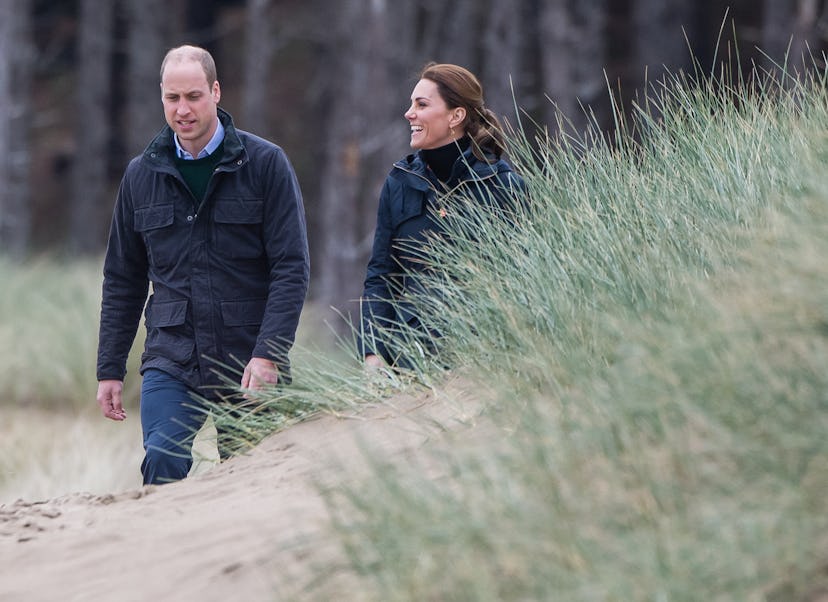 Kate Middleton and Prince William walk on the beach