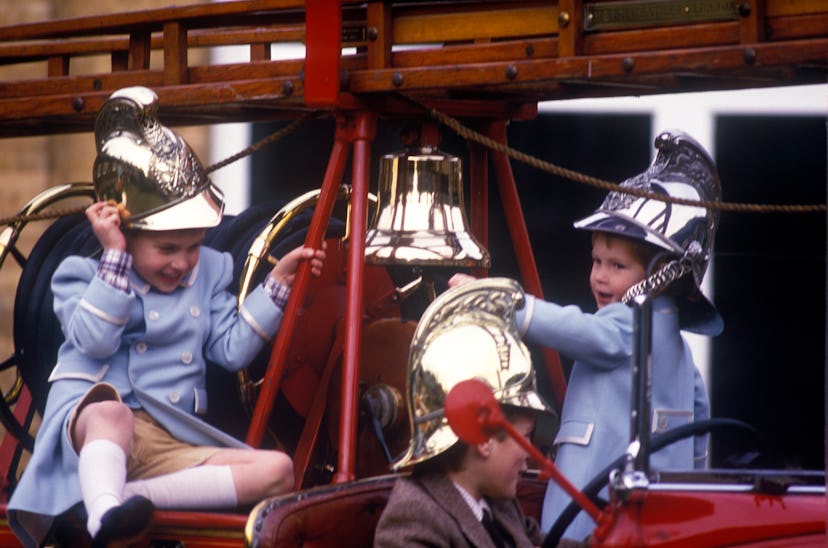 The princes pretended to fight fires in fancy coats.