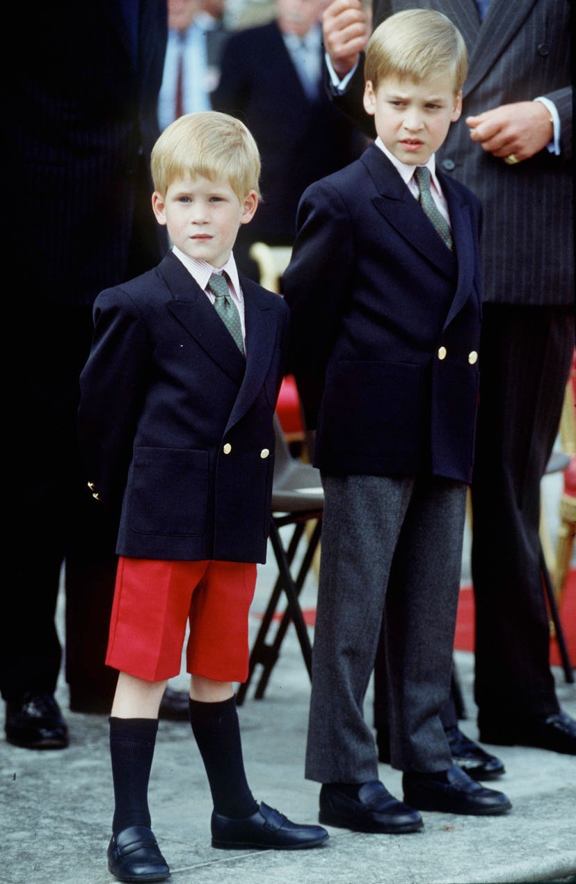 Prince Harry matches his big brother wearing a suit.