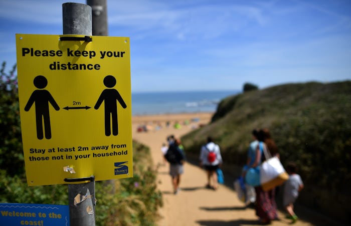 social distancing sign at beach