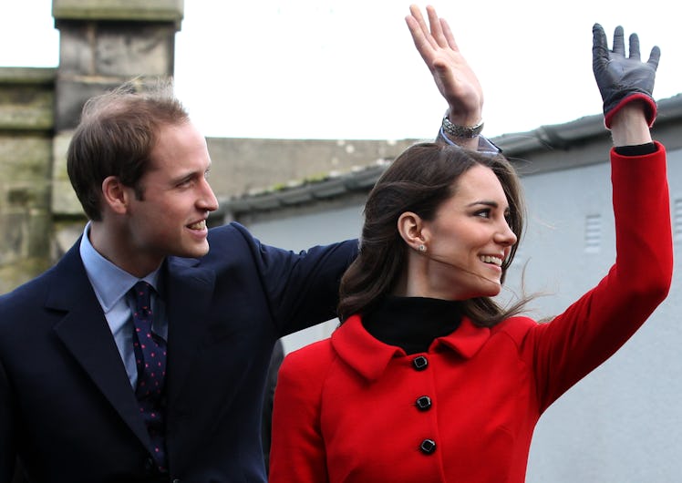 Prince William and Kate Middleton wave to fans.