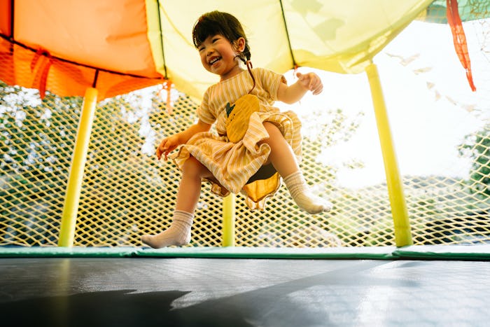 little girl on trampoline