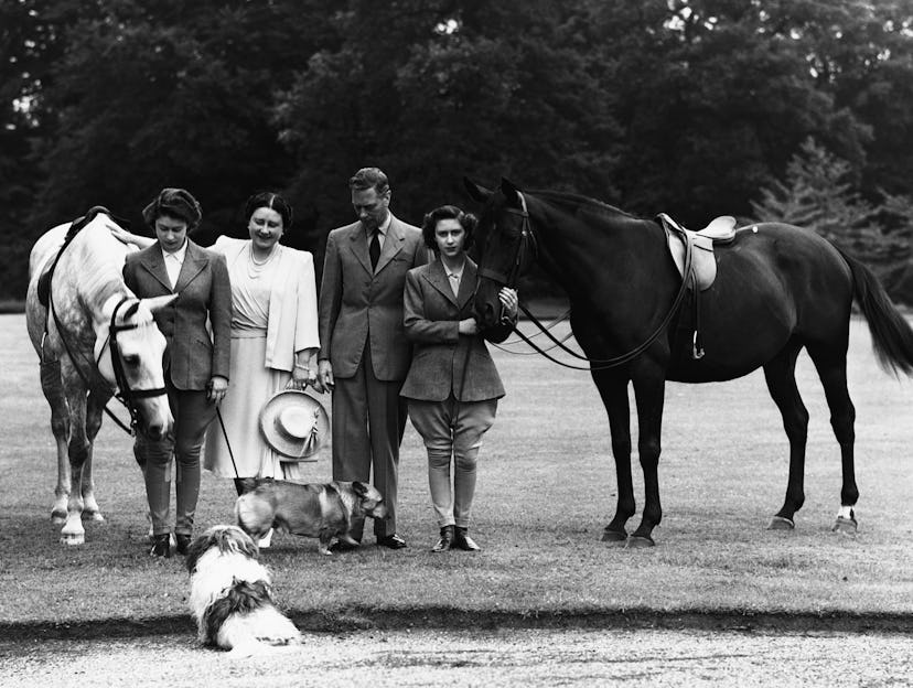 King George VI posed with his family and their horses.