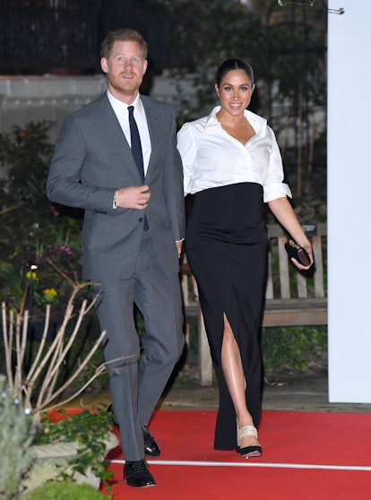 Meghan Markle wore Givenchy's white button-down shirt and black maxi skirt in February 2019. 